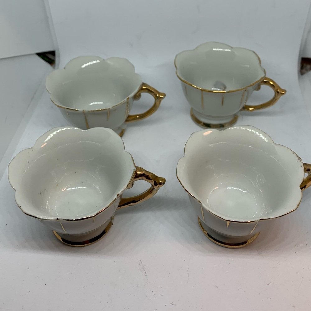 Four small porcelain espresso cups antiques